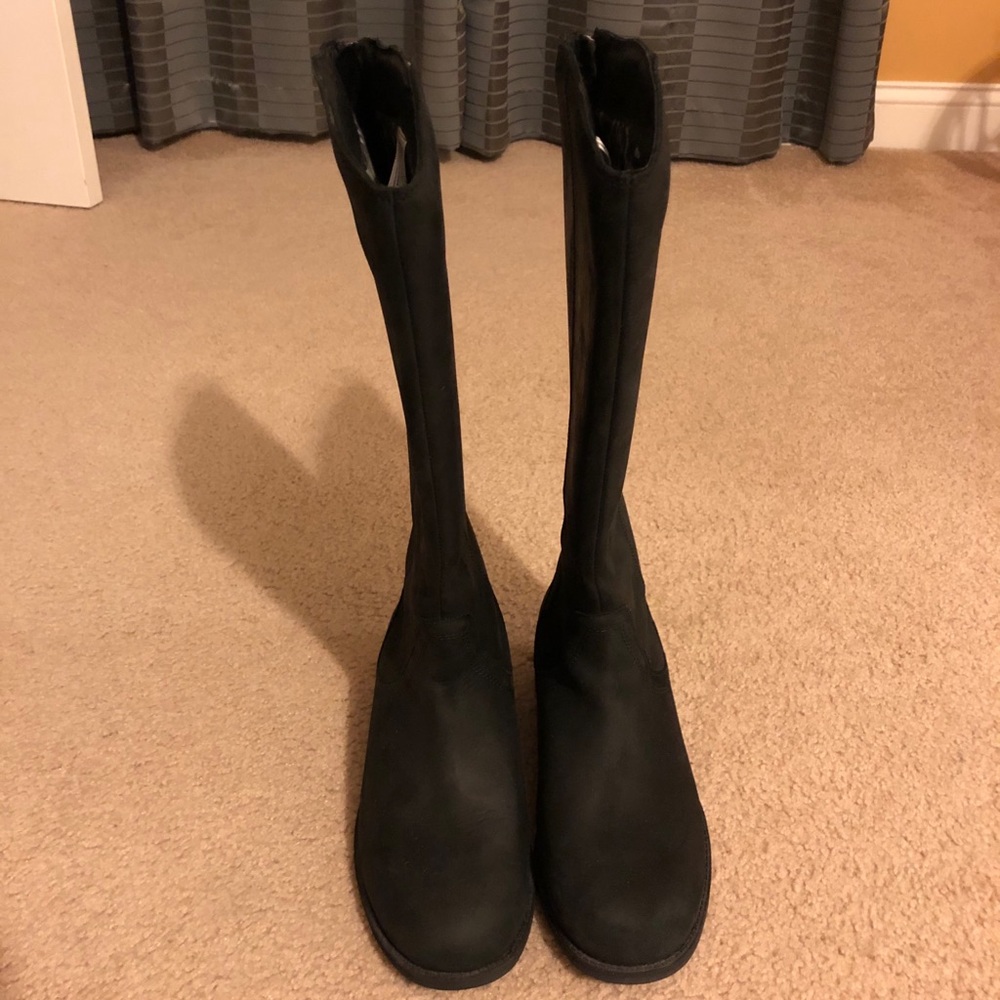 Brand new Ugg tall boot in black.